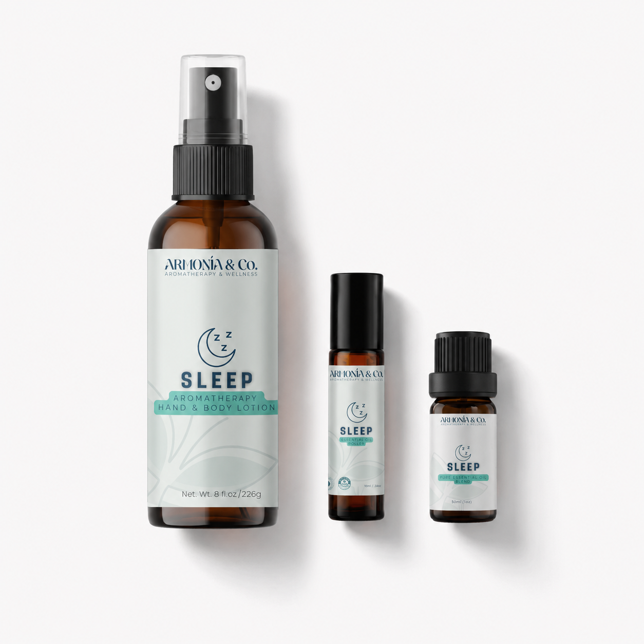 Set of Armonia & Co. sleep-themed products including a essential oil bottler, roller bottles, and a spray bottle on a white background.