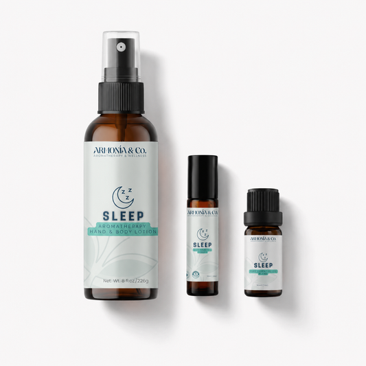 Set of Armonia & Co. sleep-themed products including a essential oil bottler, roller bottles, and a spray bottle on a white background.